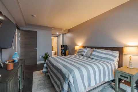 a bathroom with a sink a toilet and tub