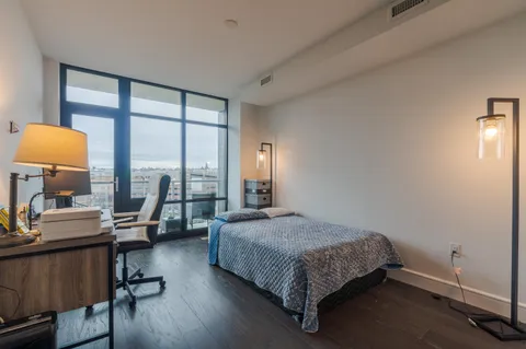 a workspace with furniture and bedroom