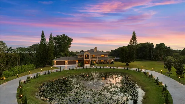 a view of a lake with a yard