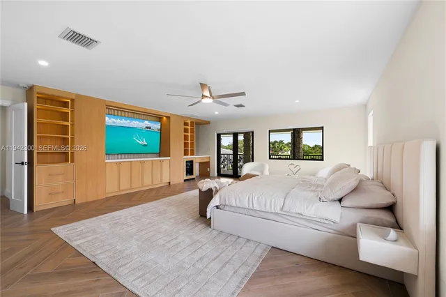 an aerial view of residential house with outdoor space and parking