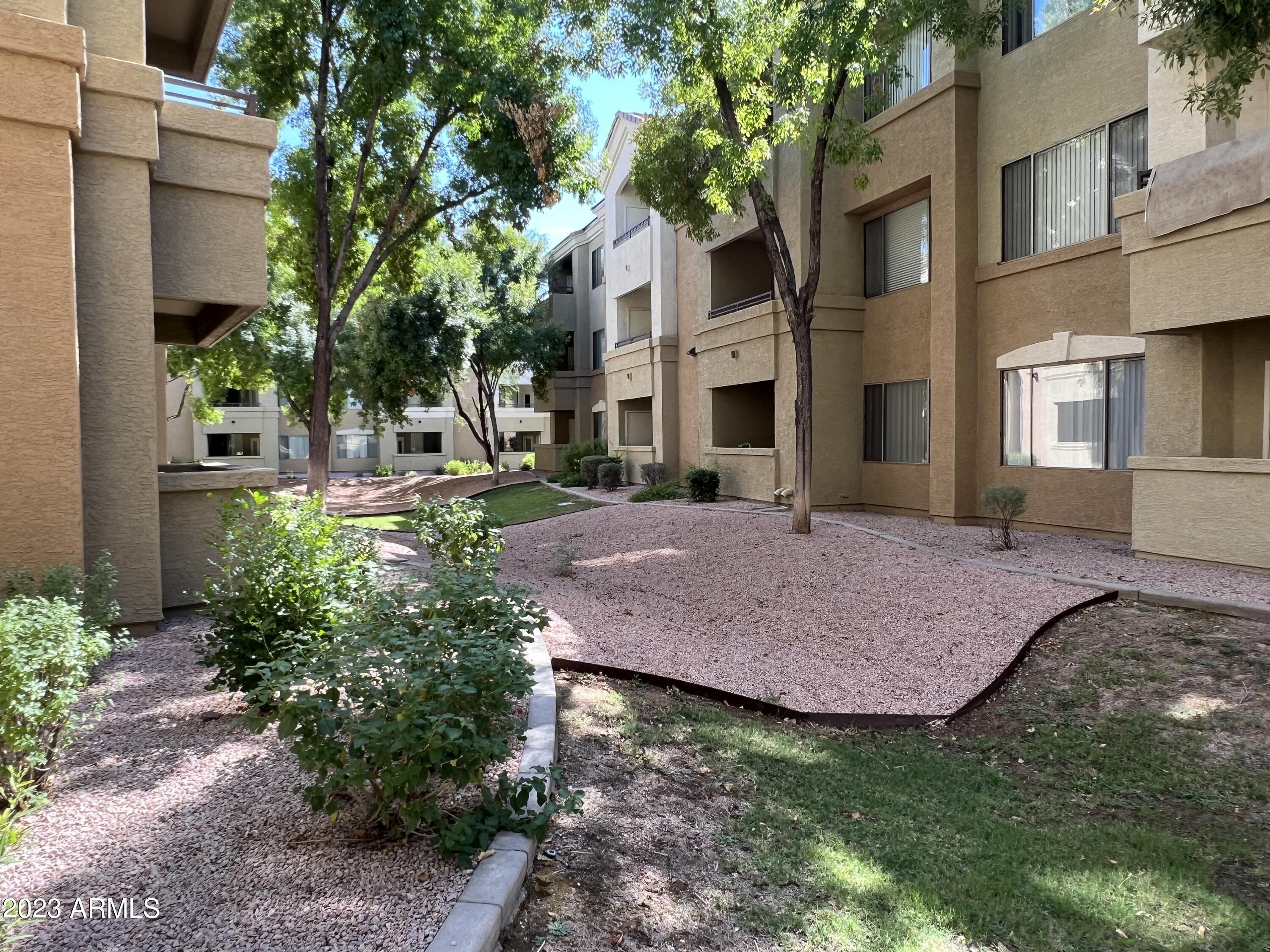 18416 North Cave Creek Road, Unit 1059 Phoenix, AZ 85032 - Photo 19 of 45 View looking at courtyyard