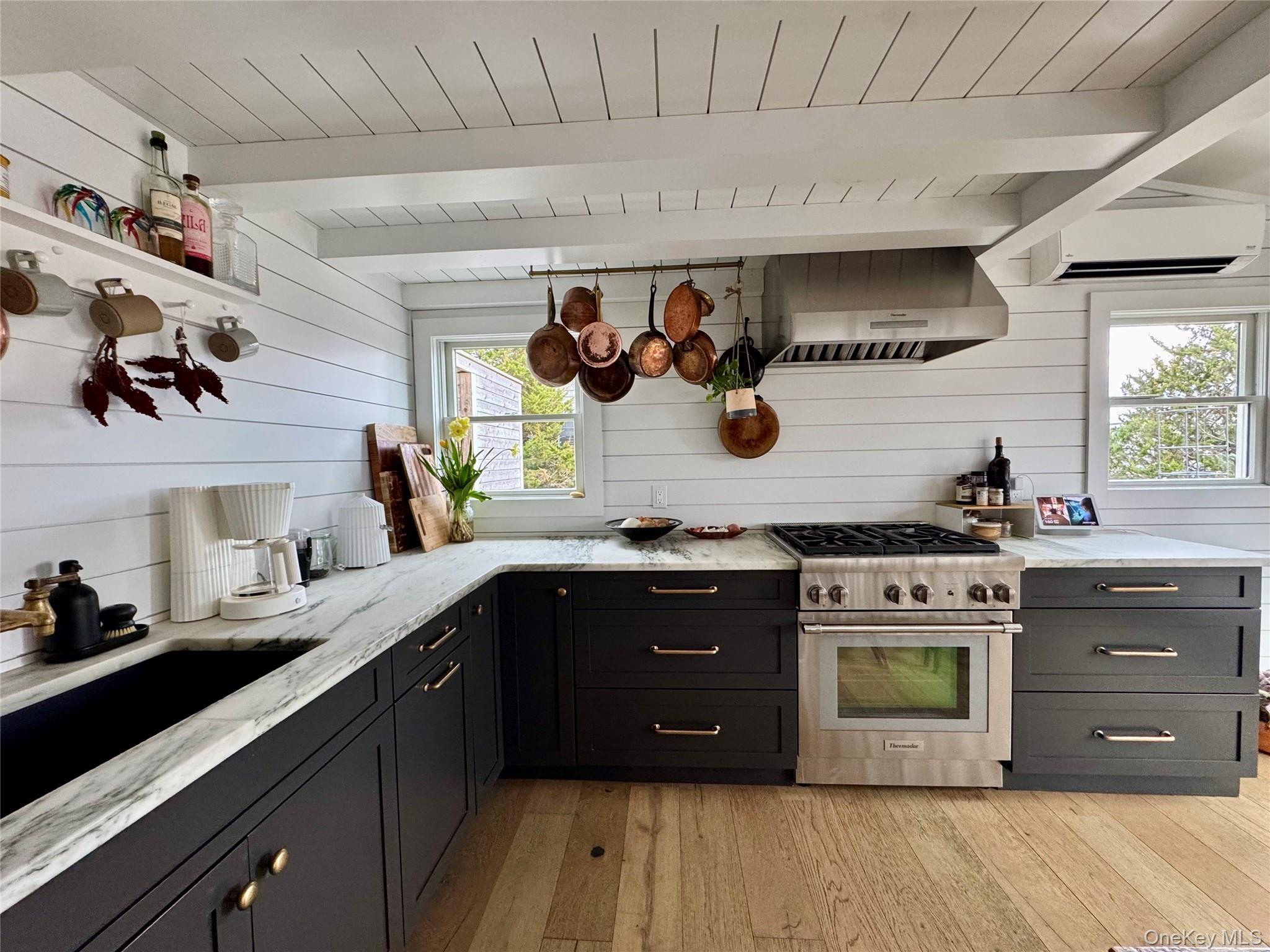 106 Oak Beach Road Babylon, NY 11702 - Photo 5 of 34 a kitchen with a stove and a sink