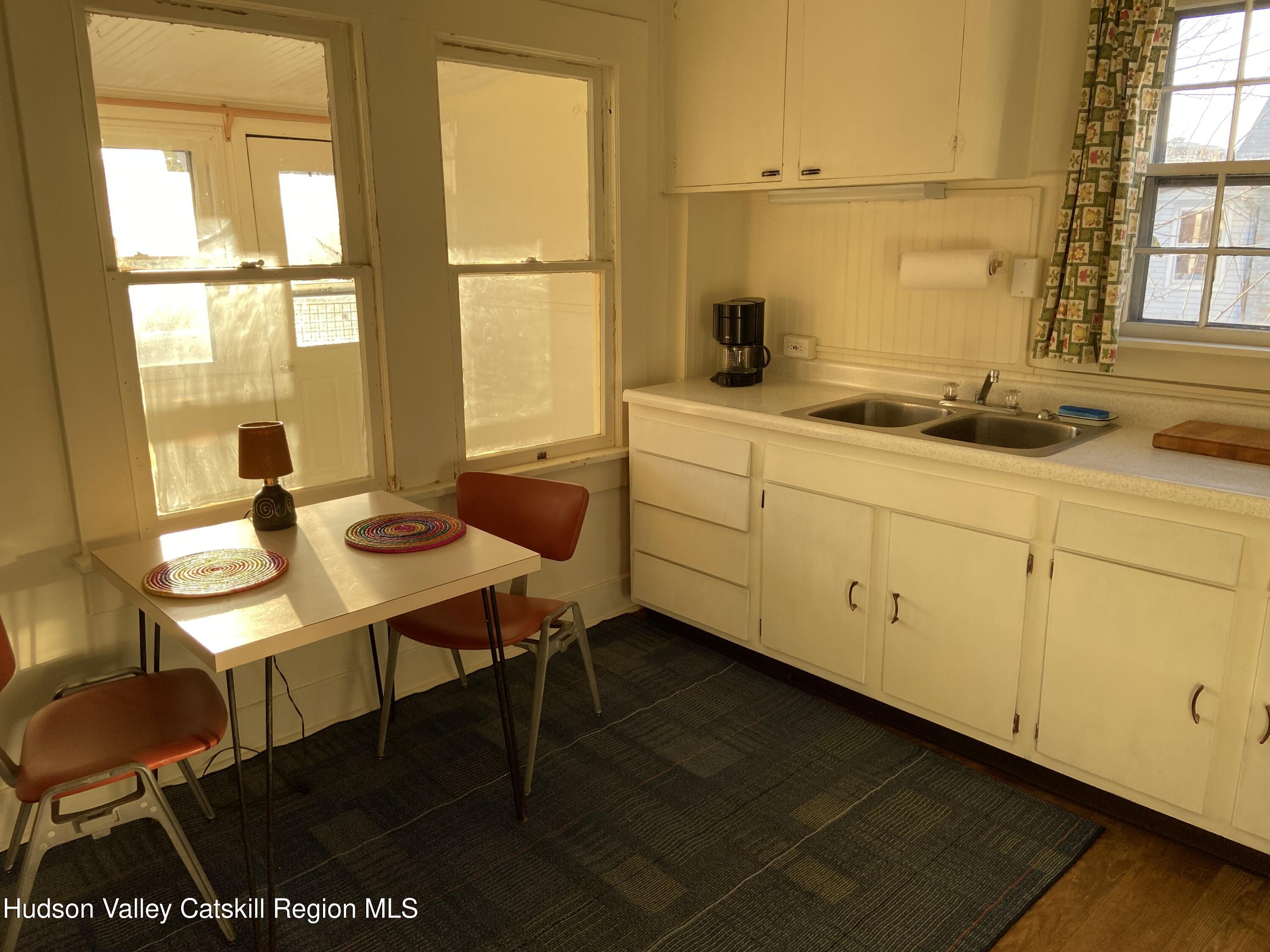 251 Robinson Street, Unit 2 Hudson, NY 12534 - Photo 5 of 7 a kitchen with sink and window