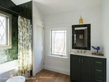 a view of an entryway door with wooden floor