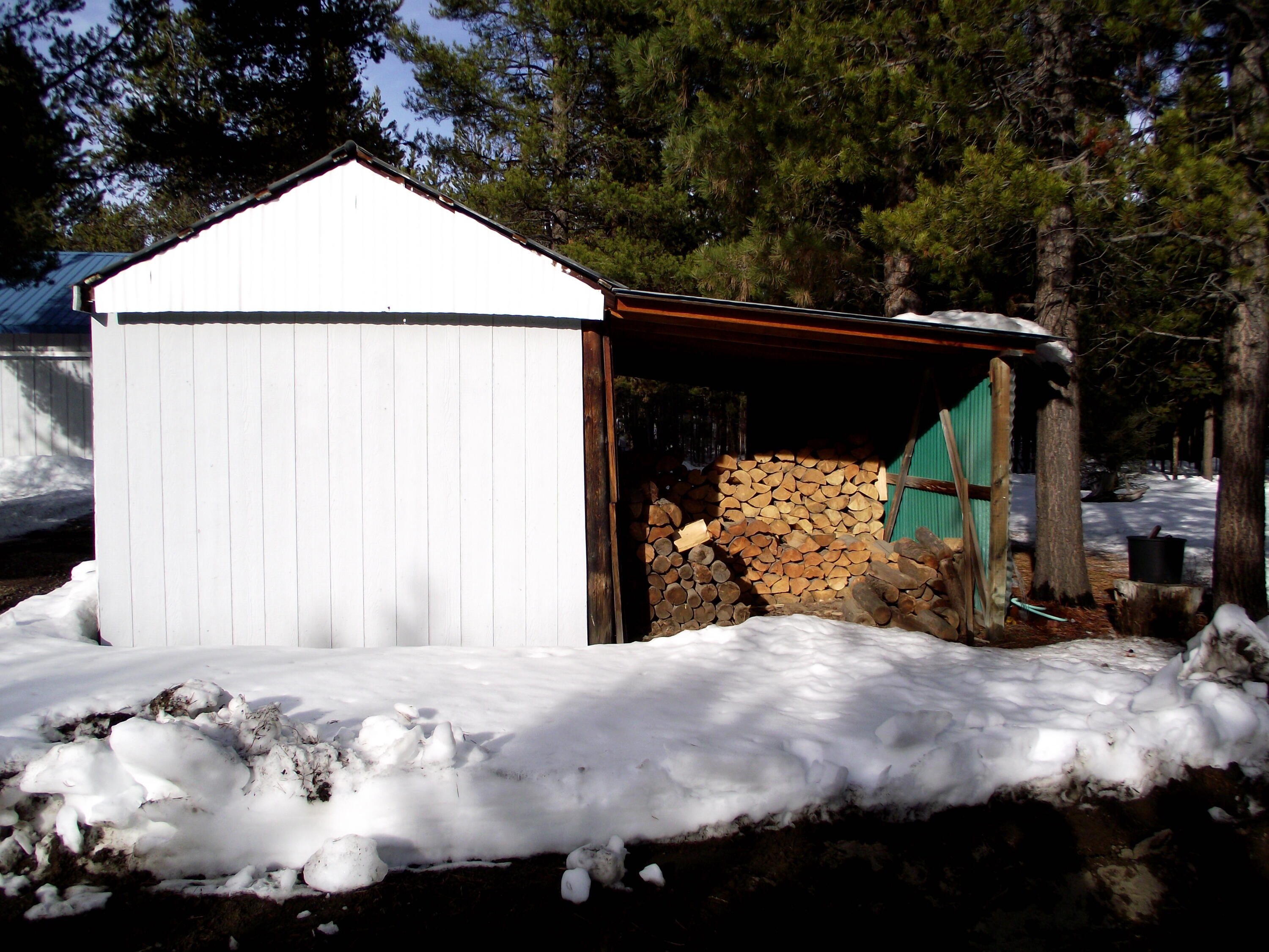 51304 Mitchell Road La Pine, OR 97739 - Photo 8 of 24 ATV/ Tractor/ Toy Storage Shed and Additional Wood Storage