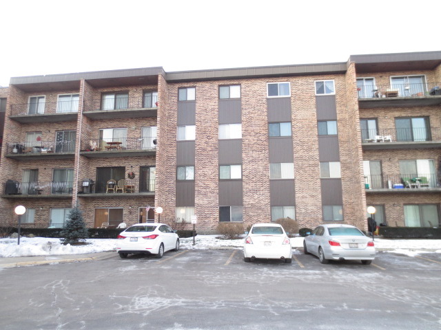 701 West Huntington Commons Road, Unit 416 Mount Prospect, IL 60056 - Photo 1 of 11