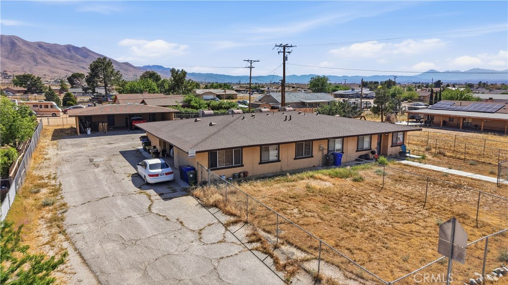 21739 Panoche Road Apple Valley, CA 92308 - Photo 1 of 49 a view of a terrace with chairs