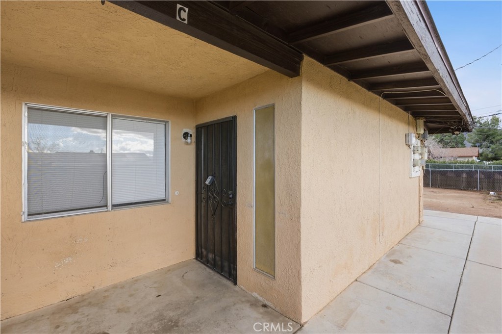 21739 Panoche Road Apple Valley, CA 92308 - Photo 2 of 49 a view of a hallway