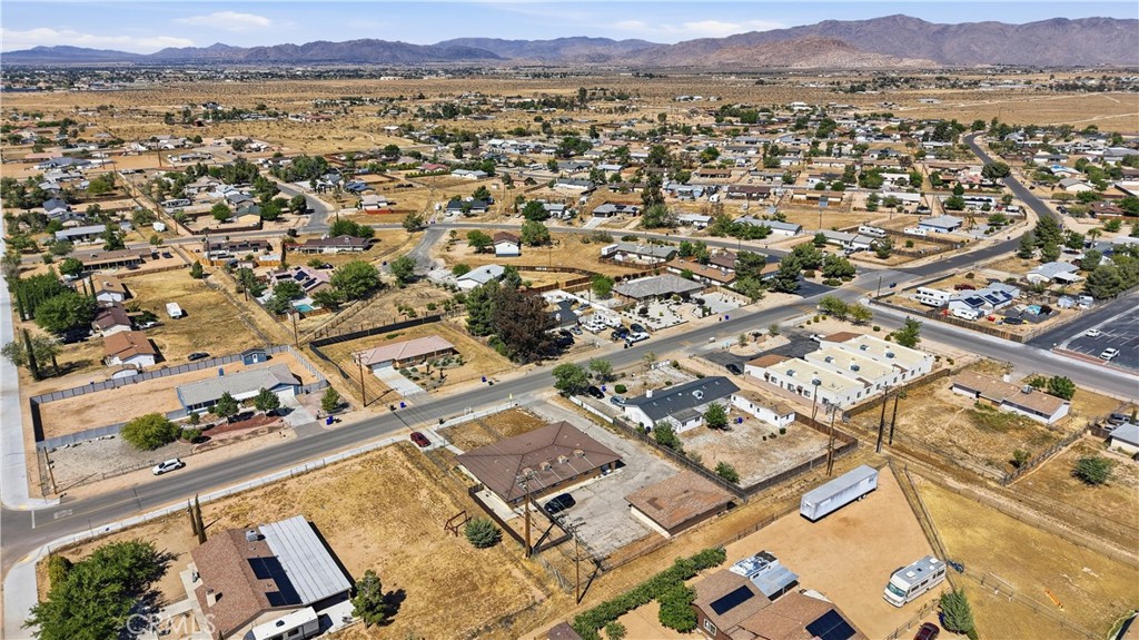 21739 Panoche Road Apple Valley, CA 92308 - Photo 40 of 49 an aerial view of residential house and outdoor space