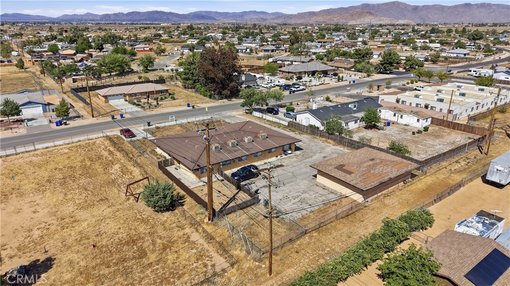 21739 Panoche Road Apple Valley, CA 92308 - Photo 41 of 49 an aerial view of houses with a city