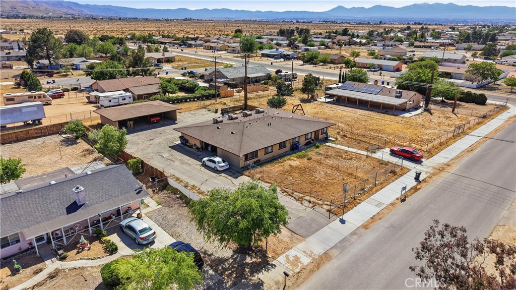 21739 Panoche Road Apple Valley, CA 92308 - Photo 45 of 49 an aerial view of a house with a mountain