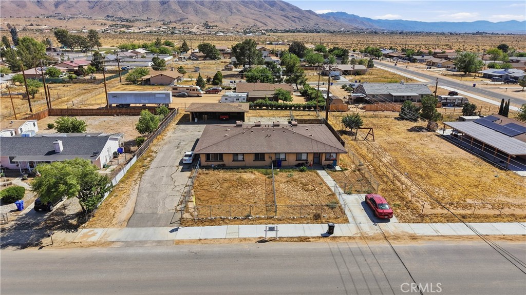 21739 Panoche Road Apple Valley, CA 92308 - Photo 46 of 49 an aerial view of a house with a garden