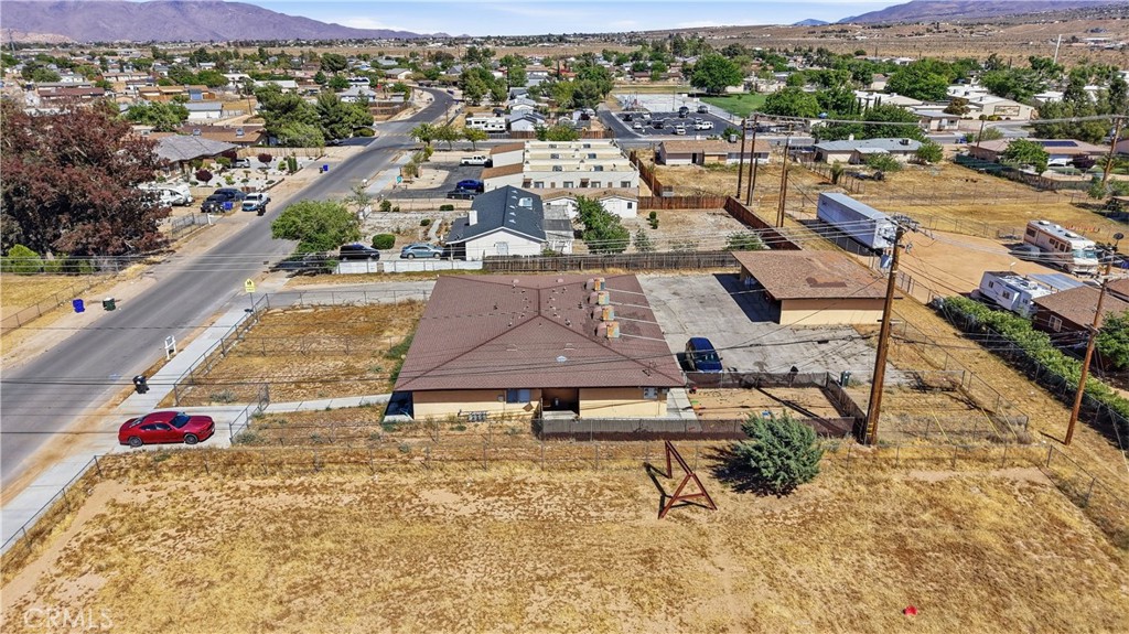 21739 Panoche Road Apple Valley, CA 92308 - Photo 48 of 49 an aerial view of residential houses with outdoor space