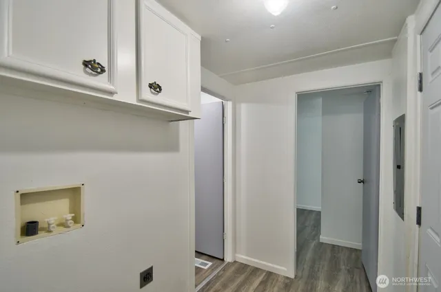 a bathroom with a sink and mirror