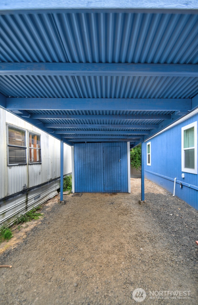 2115 Rocky Point Road Northwest, Unit 22 Bremerton, WA 98312 - Photo 2 of 16 a view of a garage