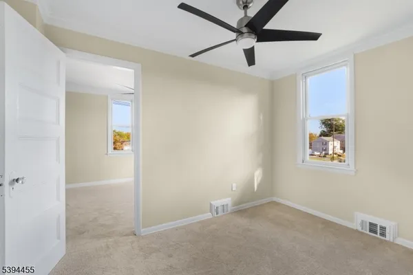 an empty room that has a window