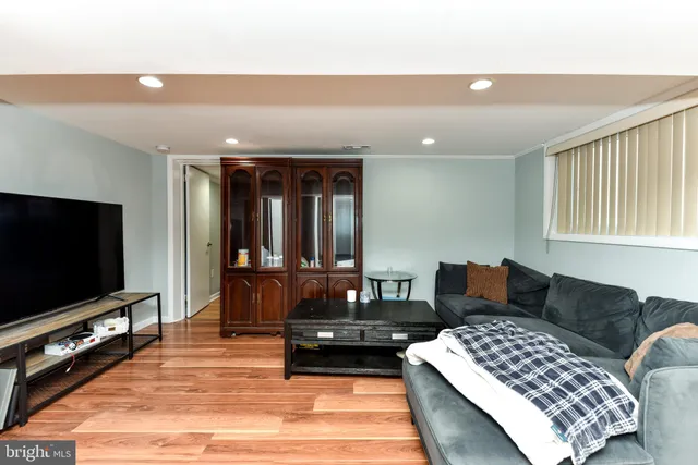 a view of a livingroom with wooden floor