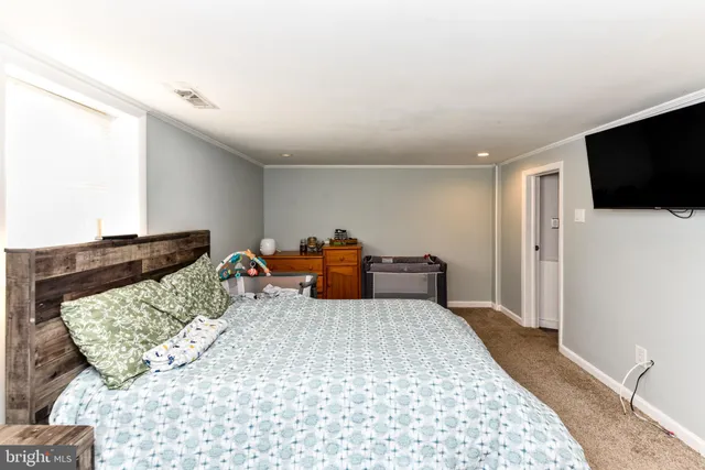 a white toilet sitting next to a bathroom sink