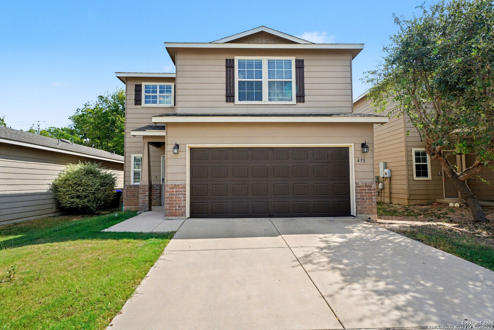 478 Walnut Crest Schertz, TX 78154 - Photo 1 of 47 a front view of a house with a yard and garage