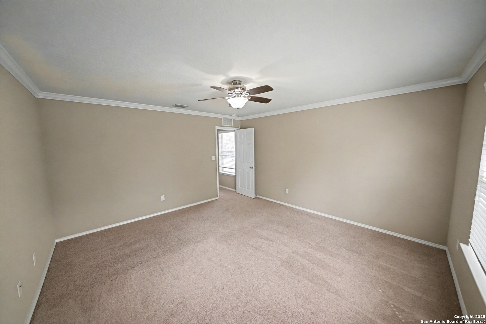 478 Walnut Crest Schertz, TX 78154 - Photo 24 of 47 an empty room with windows and fan