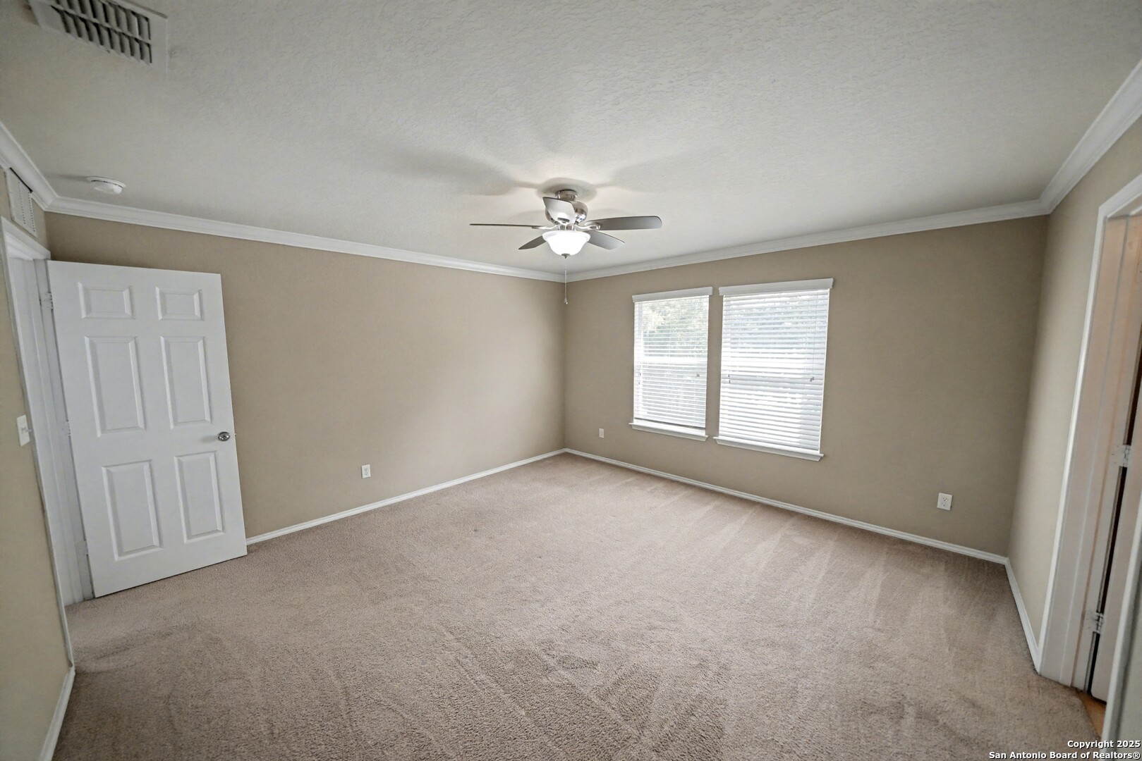 478 Walnut Crest Schertz, TX 78154 - Photo 25 of 47 an empty room with windows and ceiling fan