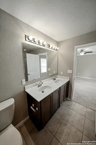 a white bath tub sitting in a bathroom
