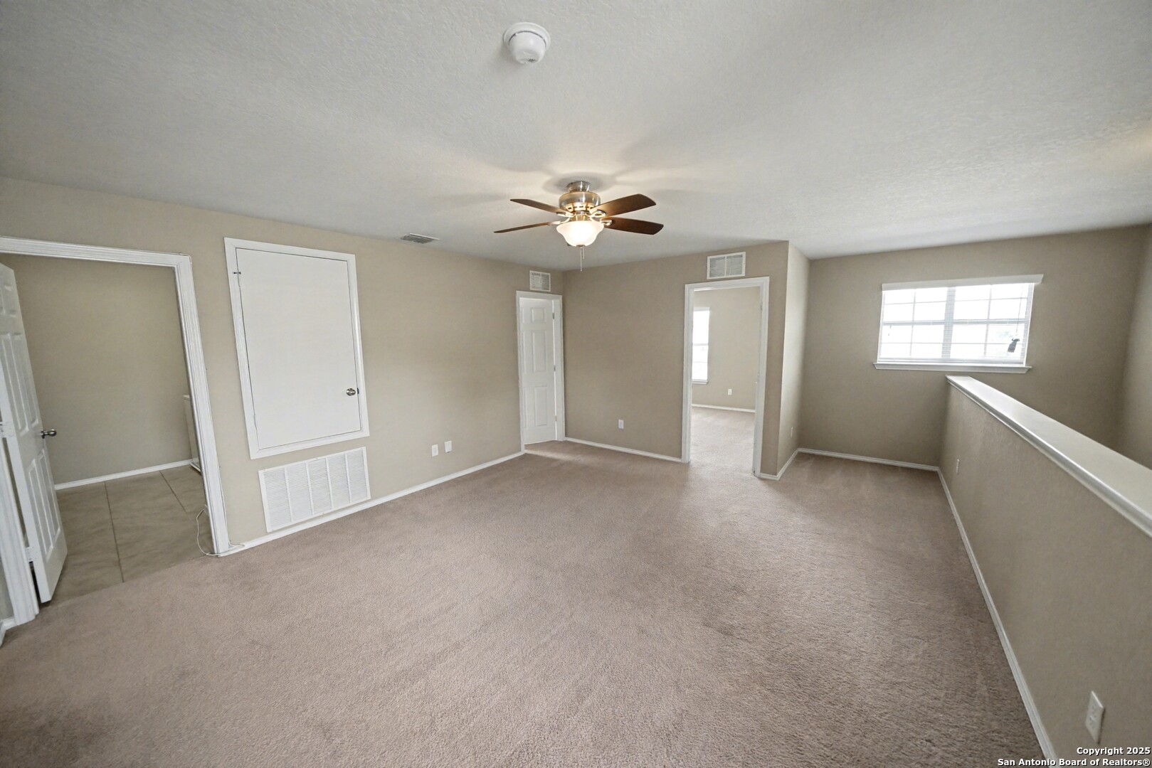478 Walnut Crest Schertz, TX 78154 - Photo 29 of 47 an empty room with fan and windows