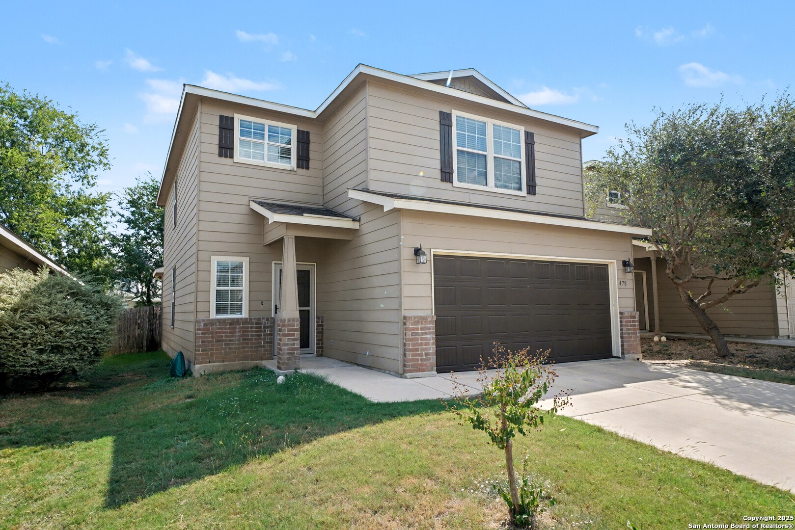 478 Walnut Crest Schertz, TX 78154 - Photo 3 of 47 a front view of a house with a yard and garage