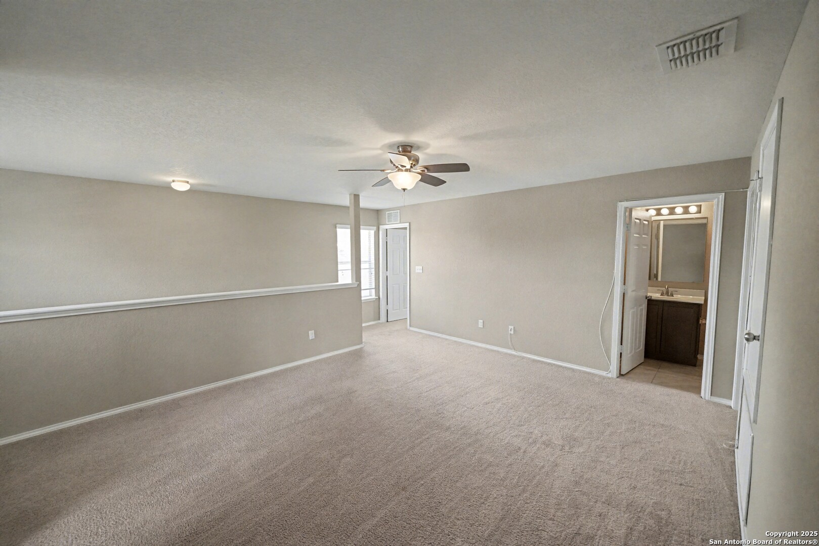 478 Walnut Crest Schertz, TX 78154 - Photo 31 of 47 a view of an empty room with a ceiling fan