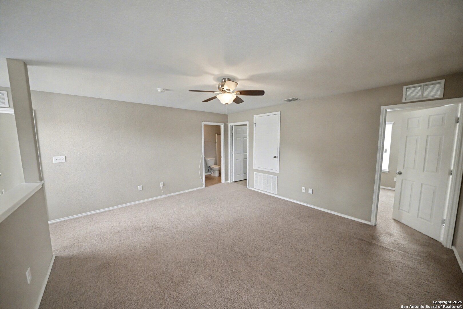 478 Walnut Crest Schertz, TX 78154 - Photo 32 of 47 an empty room with a ceiling fan and a window