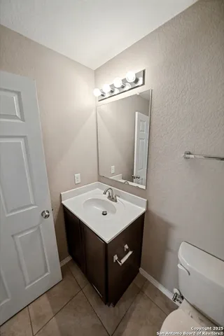 a bathroom with a shower and a toilet