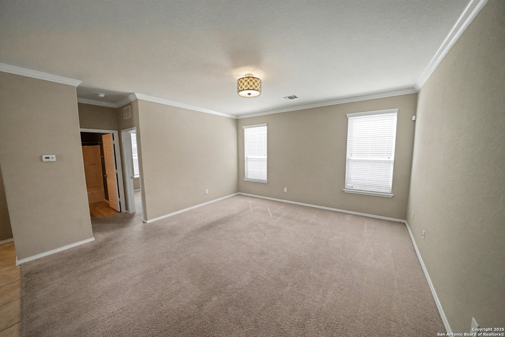 478 Walnut Crest Schertz, TX 78154 - Photo 9 of 47 a view of empty room with windows