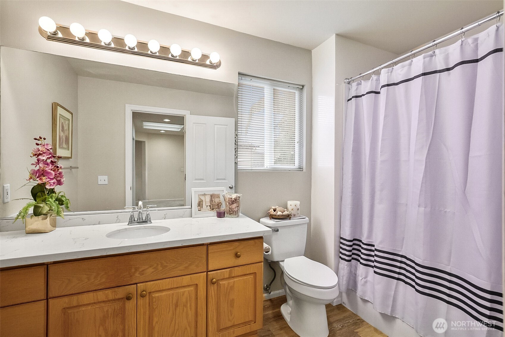 17401 33rd Drive Southeast Bothell, WA 98012 - Photo 30 of 39 a bathroom with a sink a toilet and a mirror
