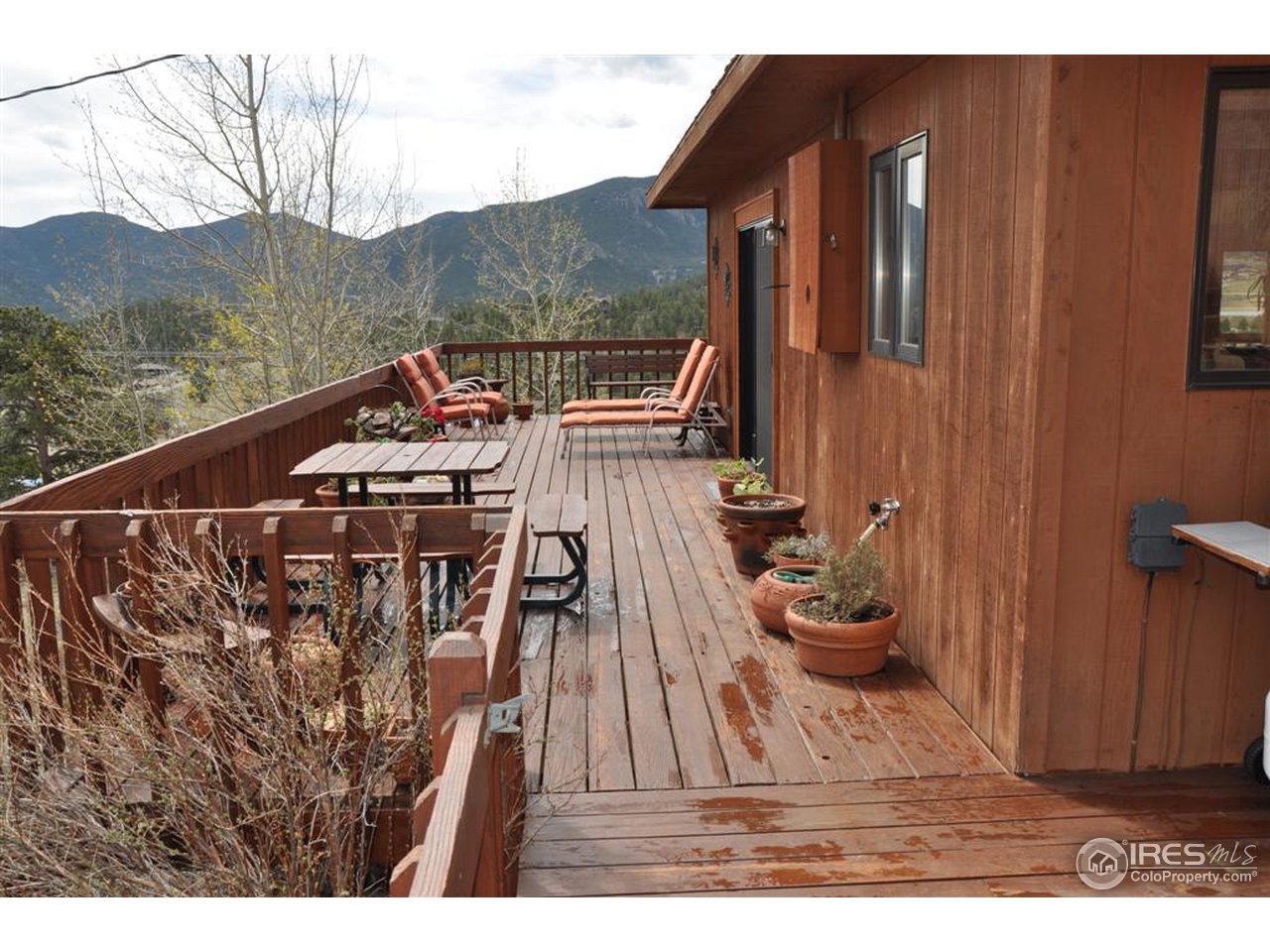 440 Venner Ranch Road Estes Park, CO 80517 - Photo 17 of 25 a view of a roof with sitting area