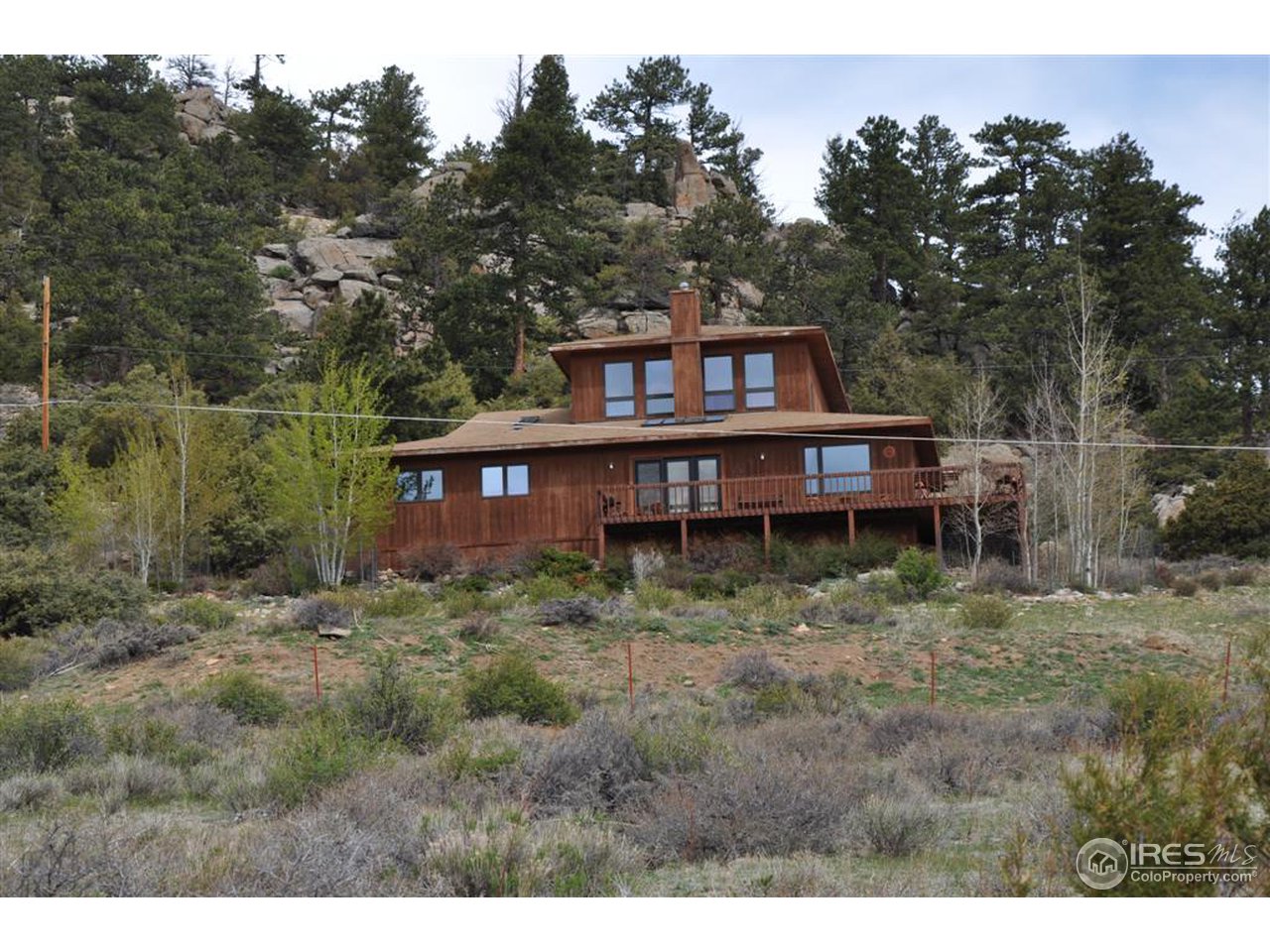 440 Venner Ranch Road Estes Park, CO 80517 - Photo 25 of 25 a view of a house with a yard
