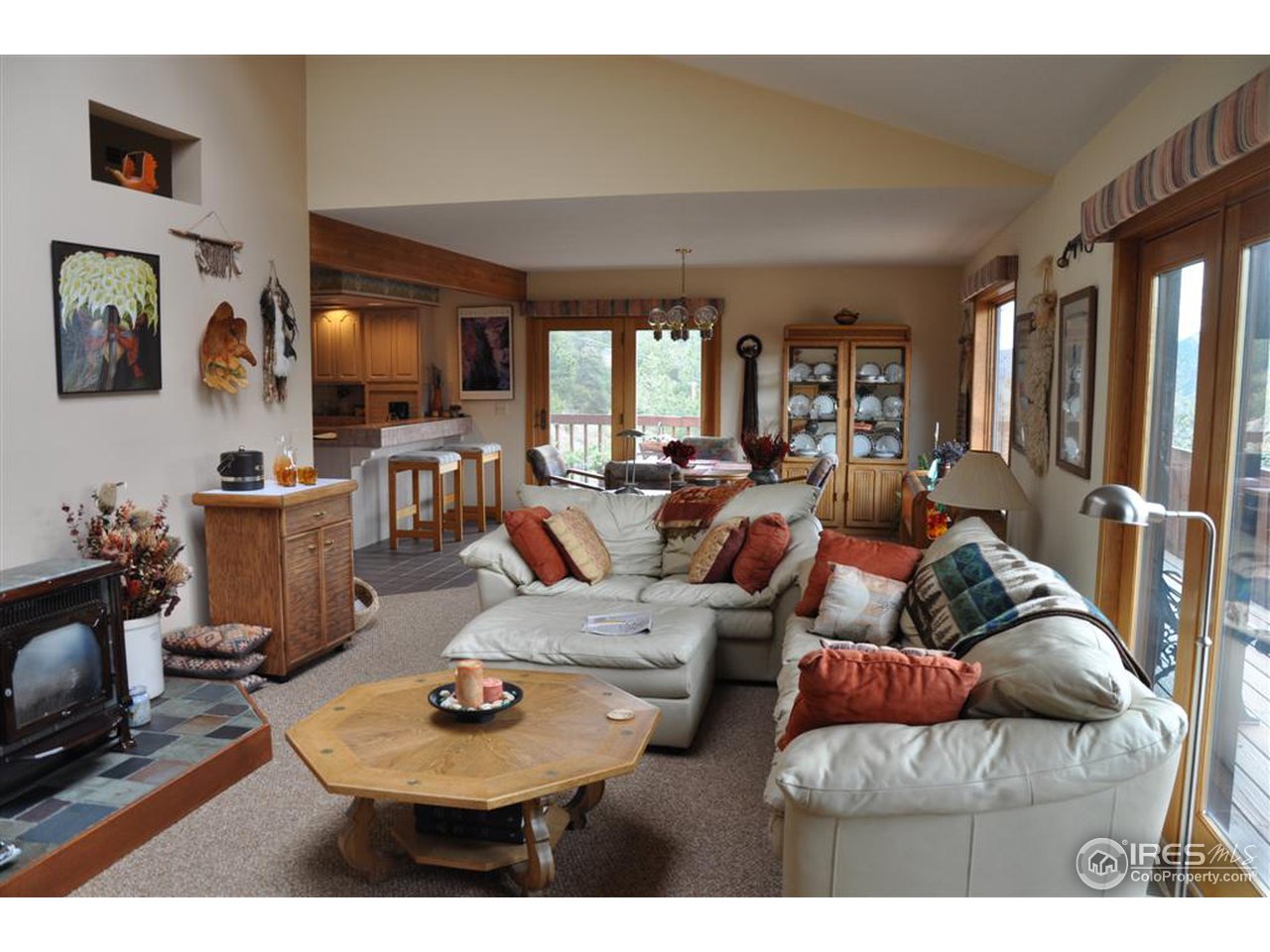 440 Venner Ranch Road Estes Park, CO 80517 - Photo 4 of 25 a living room with furniture and a flat screen tv