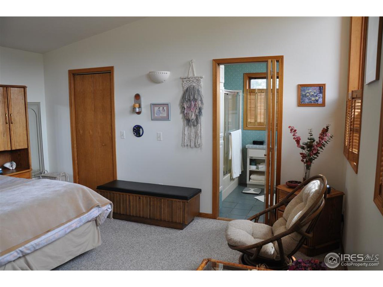 440 Venner Ranch Road Estes Park, CO 80517 - Photo 9 of 25 a bedroom with furniture and a window
