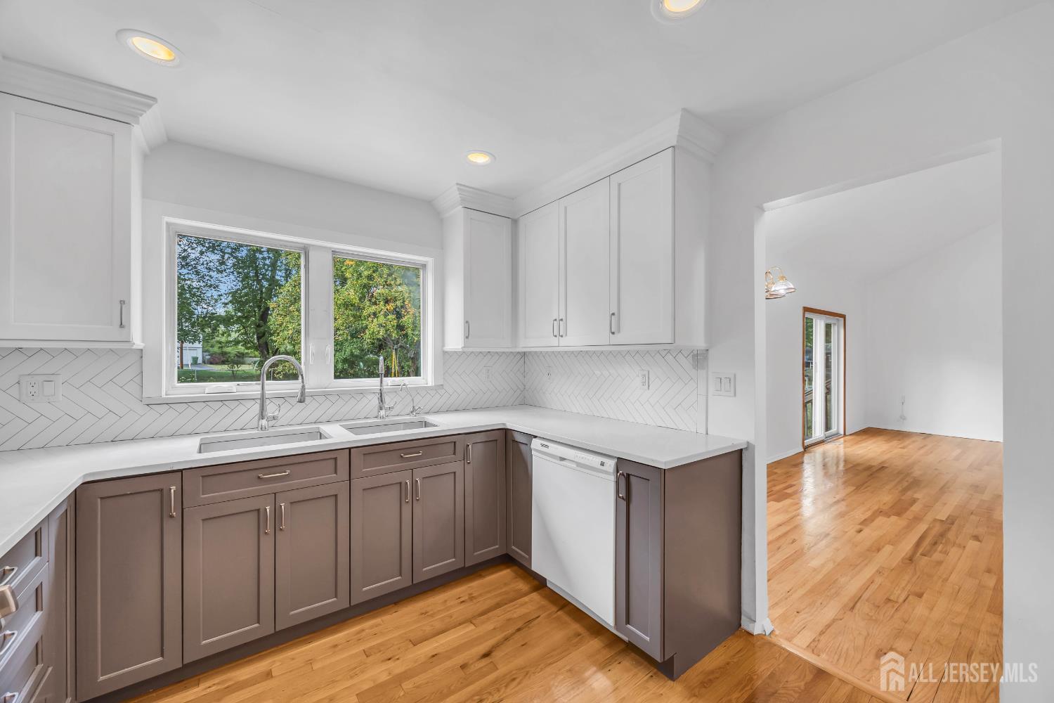 23 Barlow Road Edison, NJ 08817 - Photo 13 of 50 a kitchen with a sink stove and cabinets