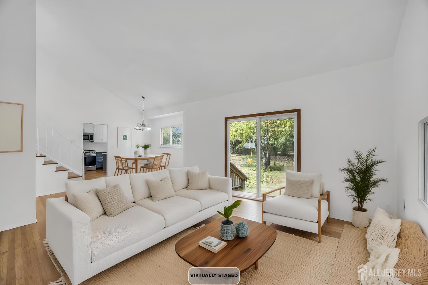 23 Barlow Road Edison, NJ 08817 - Photo 20 of 50 a living room with furniture and a large window