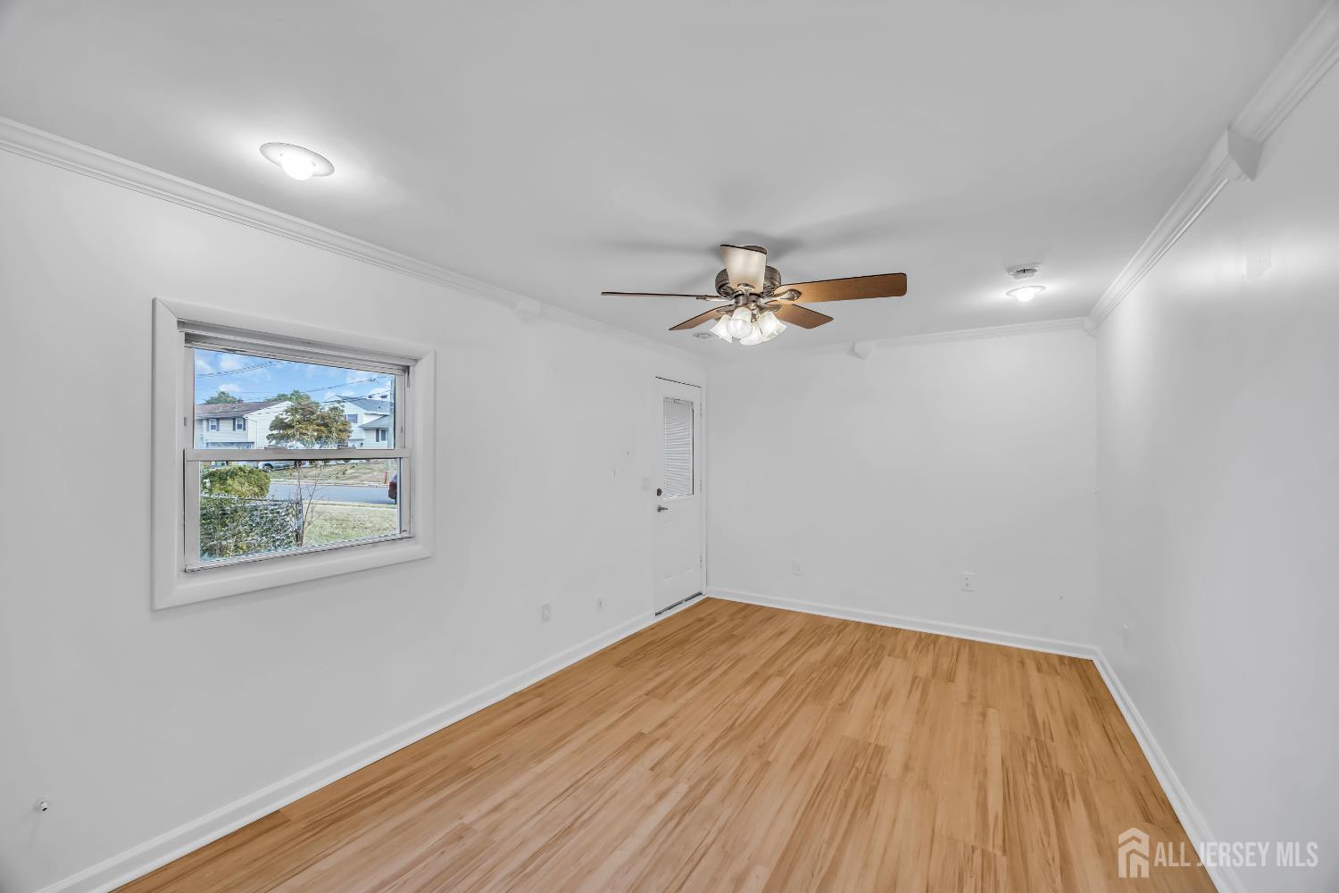 23 Barlow Road Edison, NJ 08817 - Photo 24 of 50 a view of a room with wooden floor and window