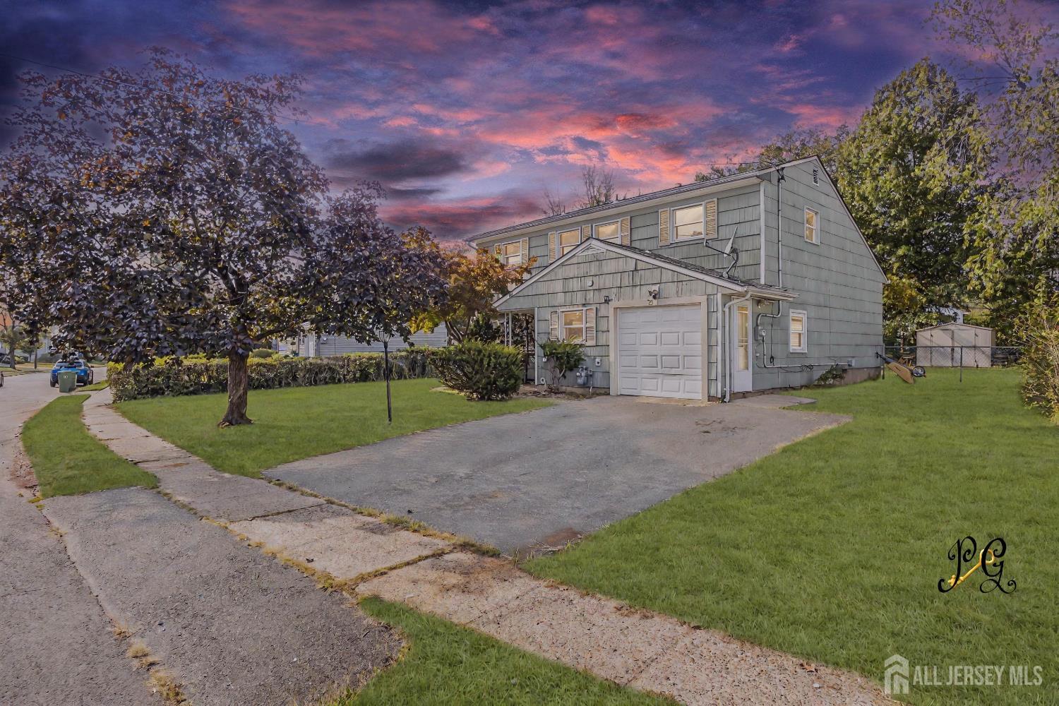 23 Barlow Road Edison, NJ 08817 - Photo 3 of 50 a view of a house with a yard and tree s