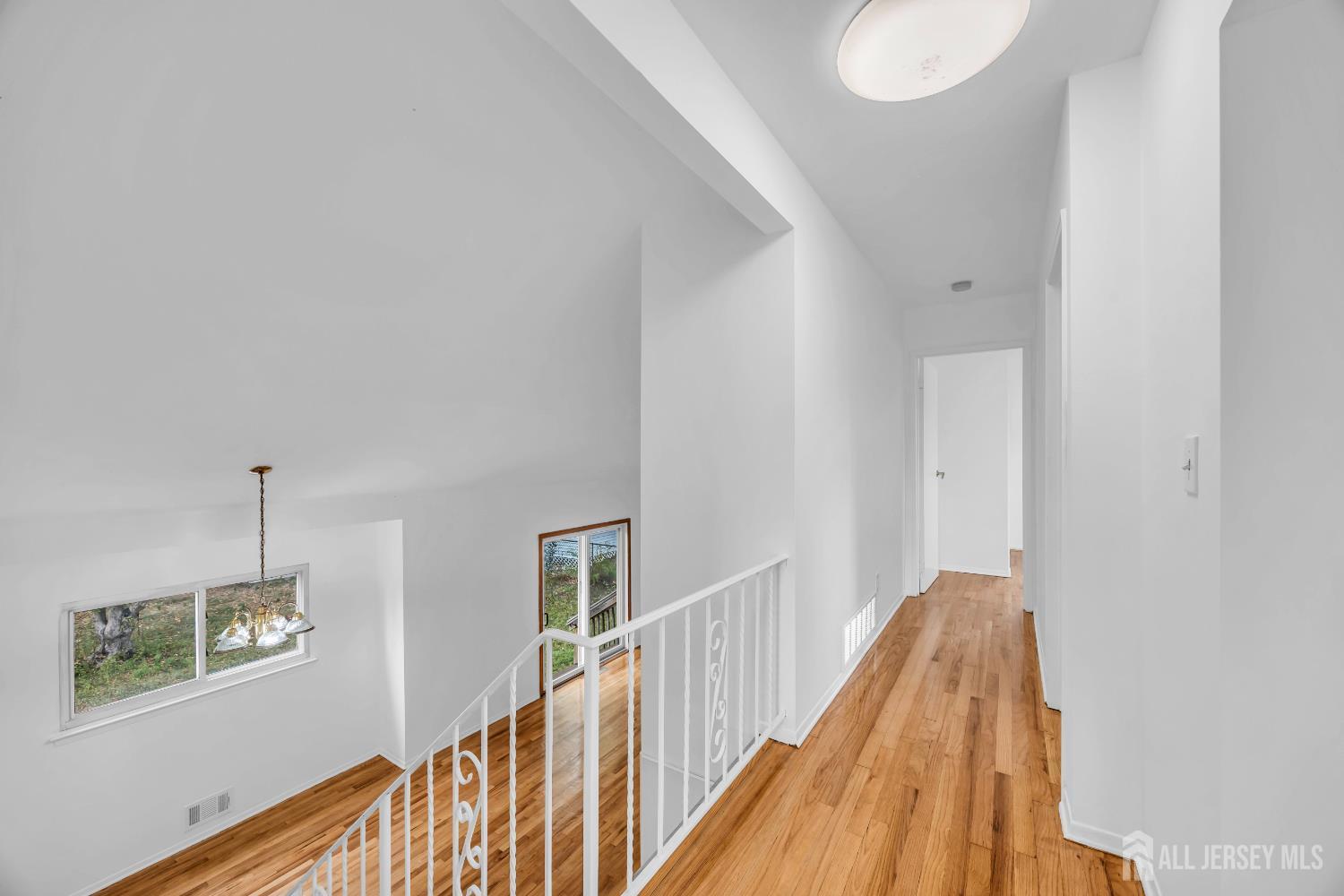 23 Barlow Road Edison, NJ 08817 - Photo 36 of 50 a view of a hallway with windows
