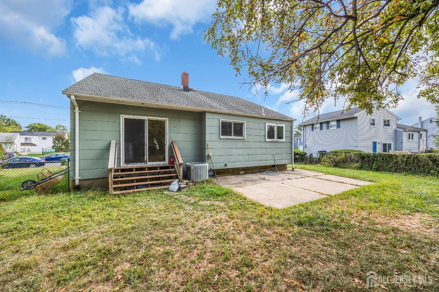 23 Barlow Road Edison, NJ 08817 - Photo 48 of 50 a view of backyard of house with green space