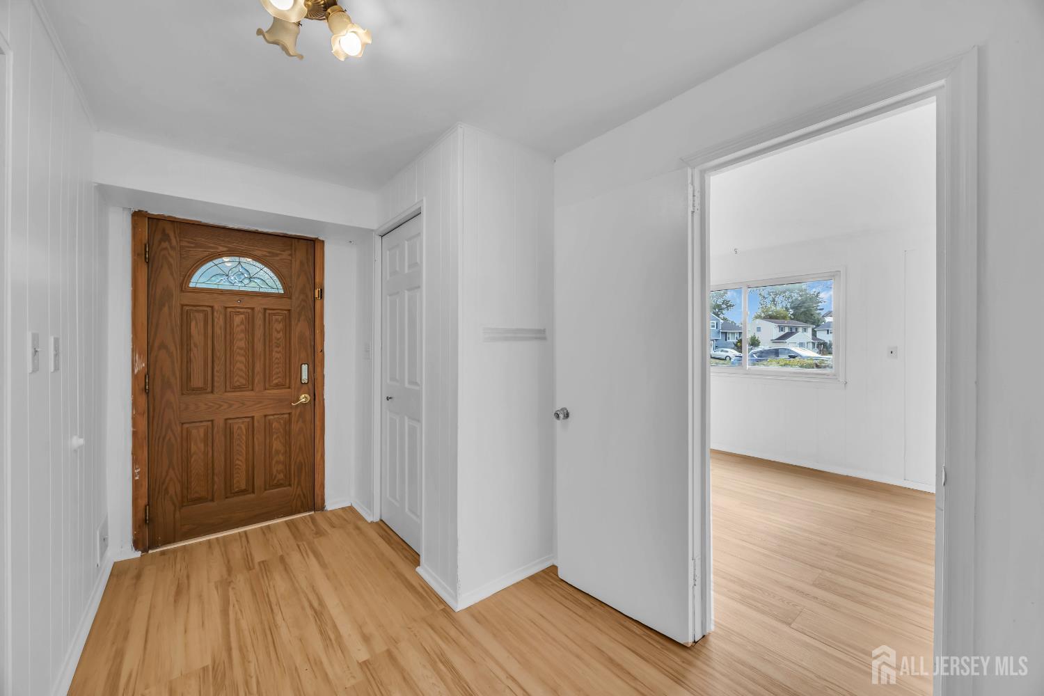 23 Barlow Road Edison, NJ 08817 - Photo 7 of 50 an empty room with closet and wooden floor