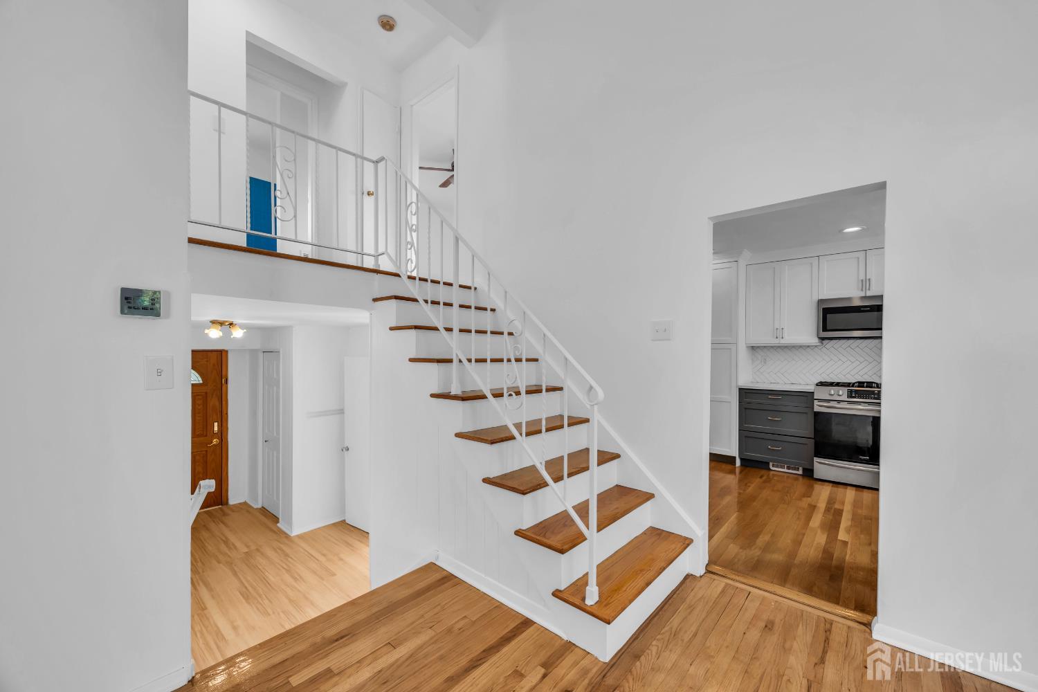 23 Barlow Road Edison, NJ 08817 - Photo 10 of 50 a view of entryway and hall with wooden floor
