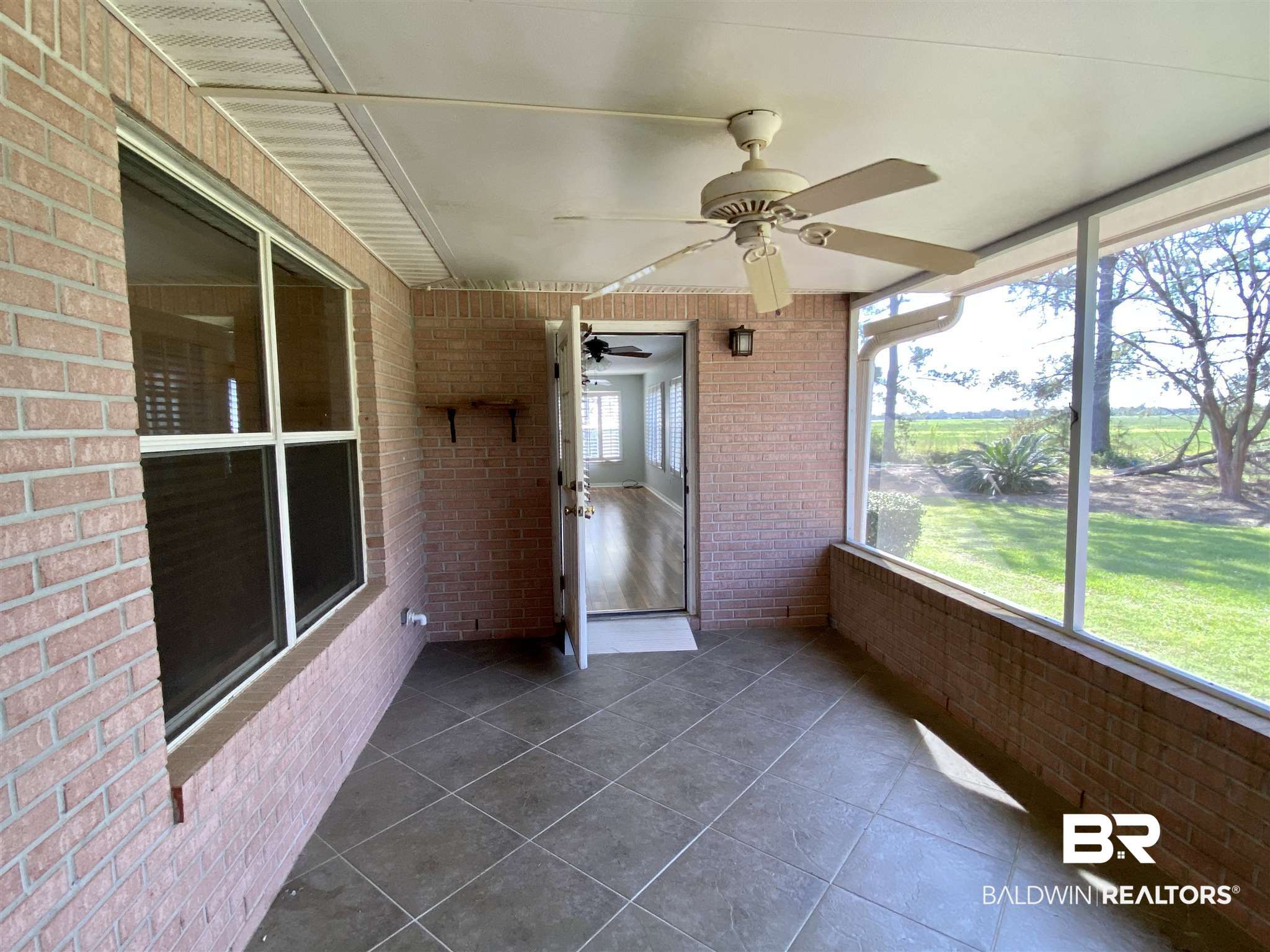 9619 Villas Drive Foley, AL 36535 - Photo 28 of 31 Screened Porch