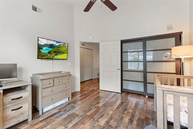 a room with furniture and a flat screen tv