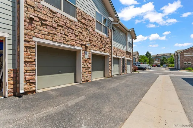 a view of a building with a street