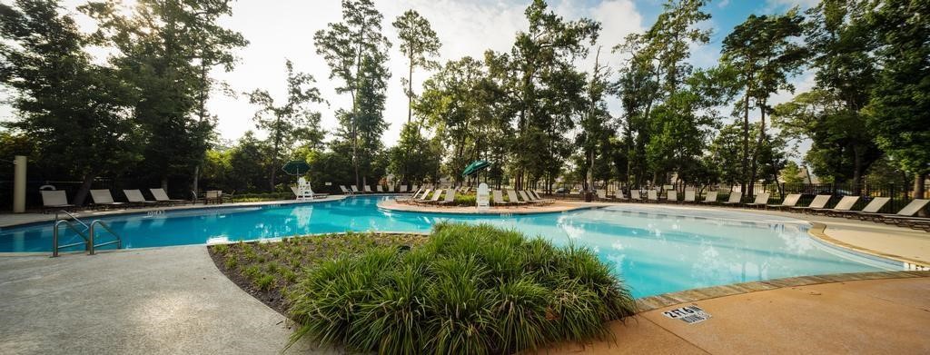 4408 Mimic Drive Spring, TX 77386 - Photo 23 of 27 a view of a swimming pool with a patio