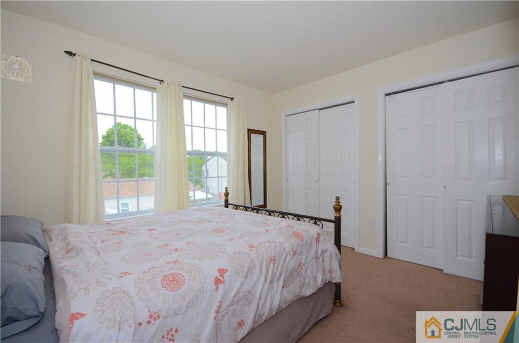 973 Clark Road North Brunswick, NJ 08902 - Photo 14 of 22 a bedroom with a bed and a window